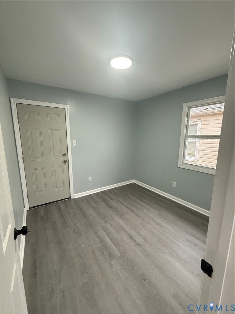 129 S Old Church Street, Petersburg, VA 23803 Bedroom 3 with back door.