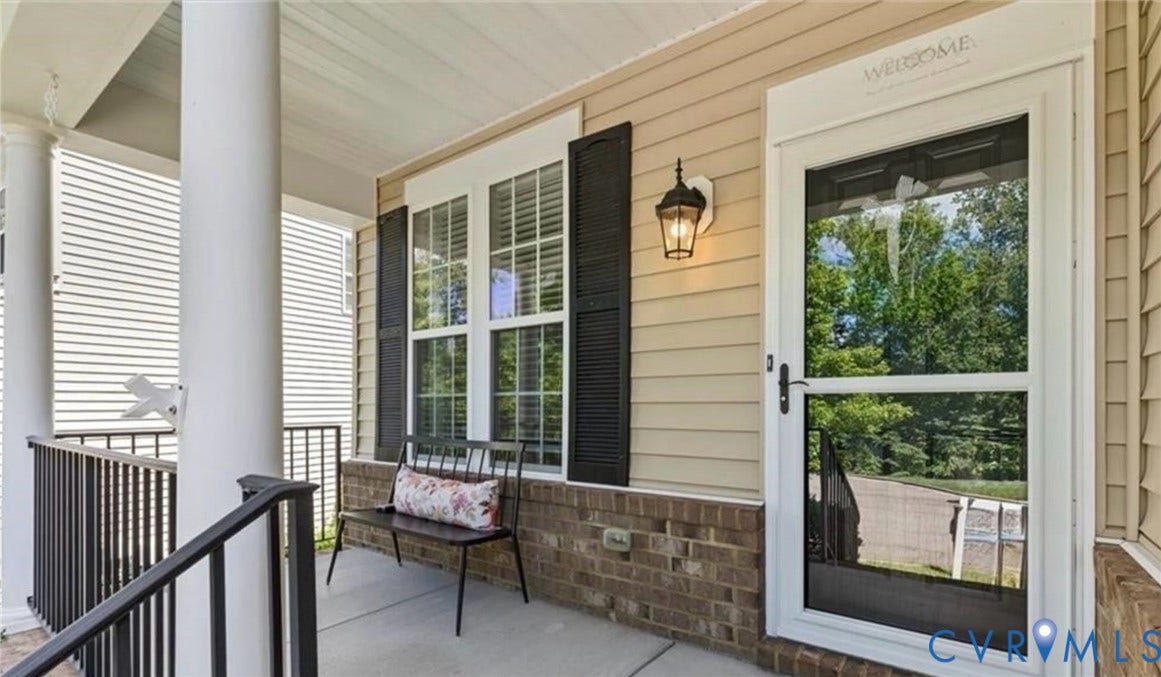 7319 Vicenzo Drive, Moseley, VA 23120 Covered front porch with a brick accent foundation, column, and white siding