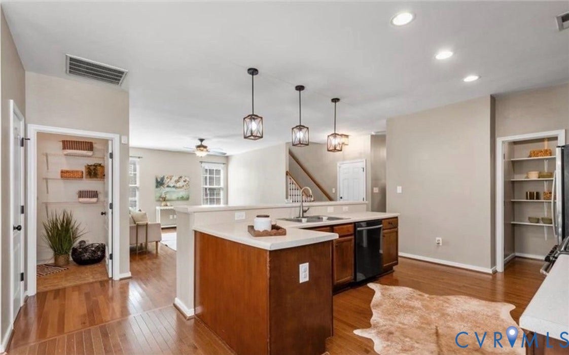7319 Vicenzo Drive, Moseley, VA 23120 Kitchen featuring wood-finish flooring, recessed lighting, white countertops, and wood cabinetry