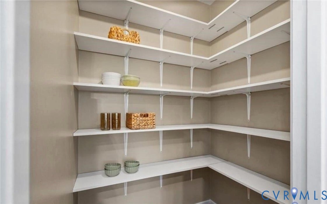 7319 Vicenzo Drive, Moseley, VA 23120 Corner pantry with extensive white shelving