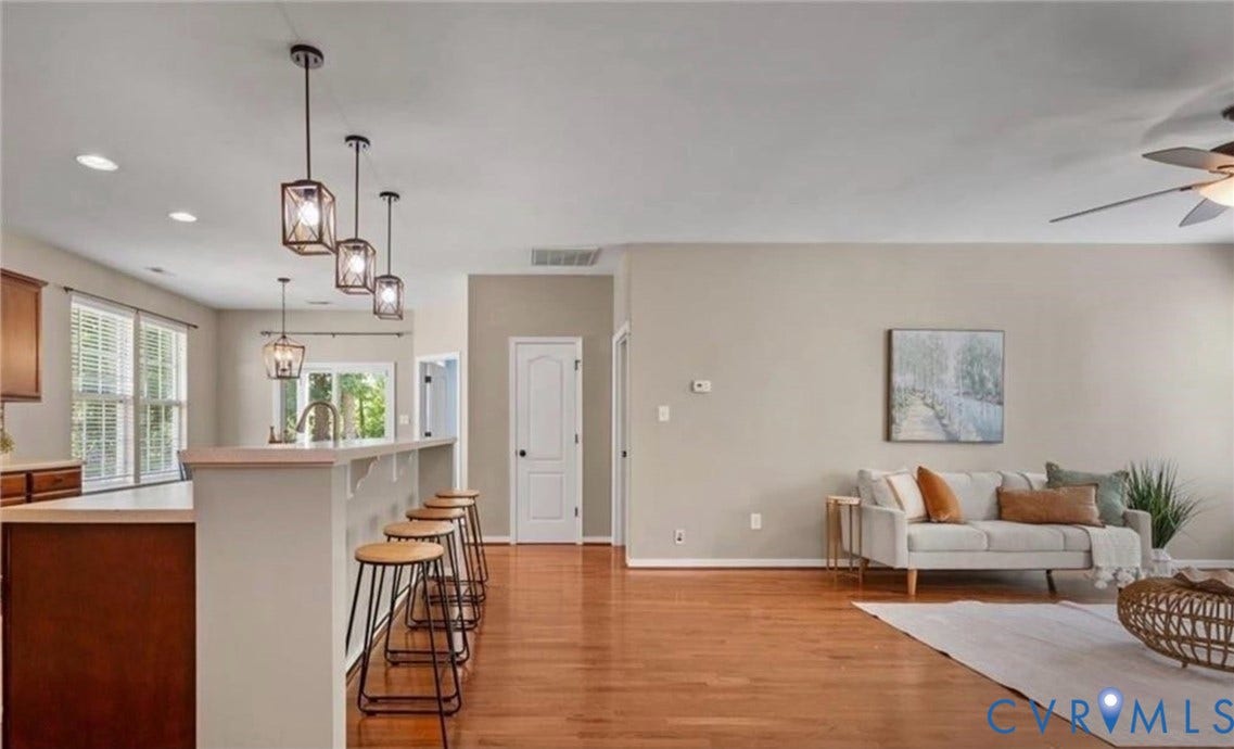 7319 Vicenzo Drive, Moseley, VA 23120 Open-concept living space featuring wood-finish flooring, recessed lighting, and a ceiling fan