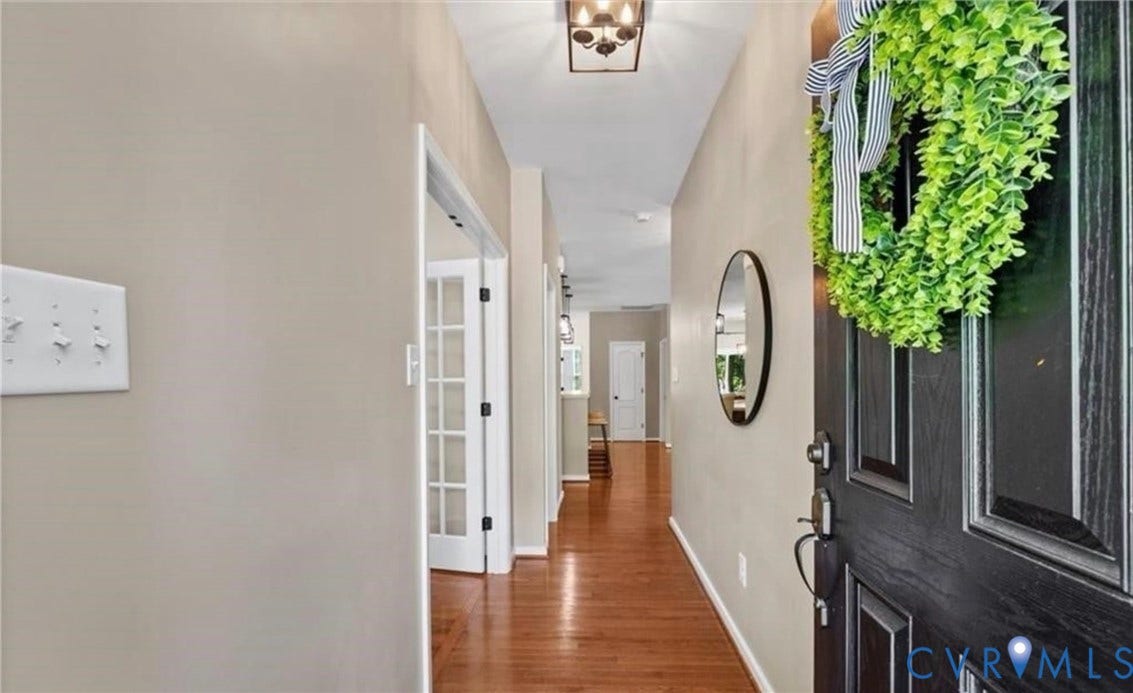 7319 Vicenzo Drive, Moseley, VA 23120 Hardwood flooring, neutral wall tones, french doors, recessed lighting, and a contemporary ceiling fixture