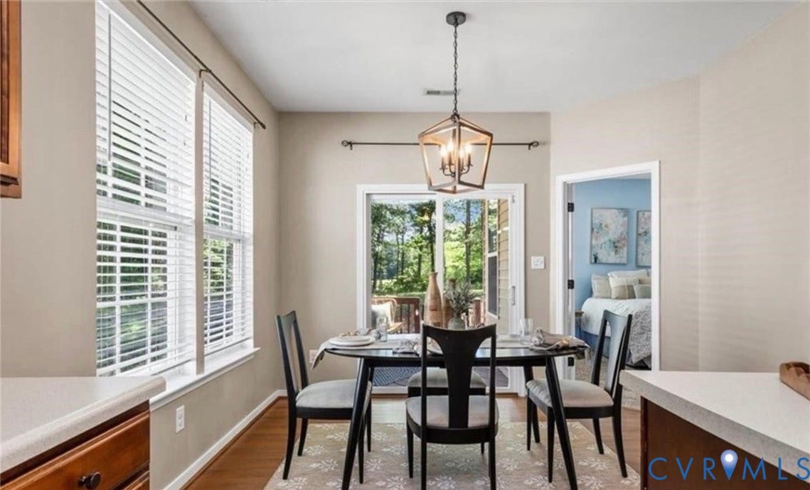 7319 Vicenzo Drive, Moseley, VA 23120 Hardwood-finish flooring, recessed lighting, and a modern geometric light fixture