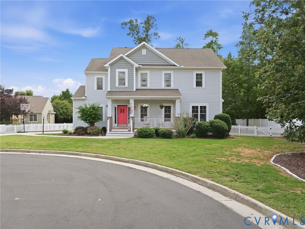 13925 Gorham Lane, Charter Colony, Midlothian, VA 23114 Two-story residence with light gray siding, white trim, and a prominent front porch