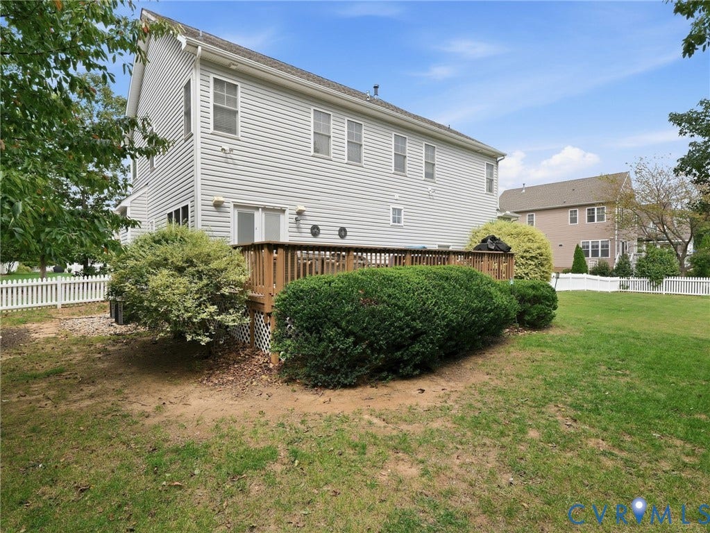 13925 Gorham Lane, Charter Colony, Midlothian, VA 23114 Exterior siding with multiple windows, wooden deck, and surrounding lawn area