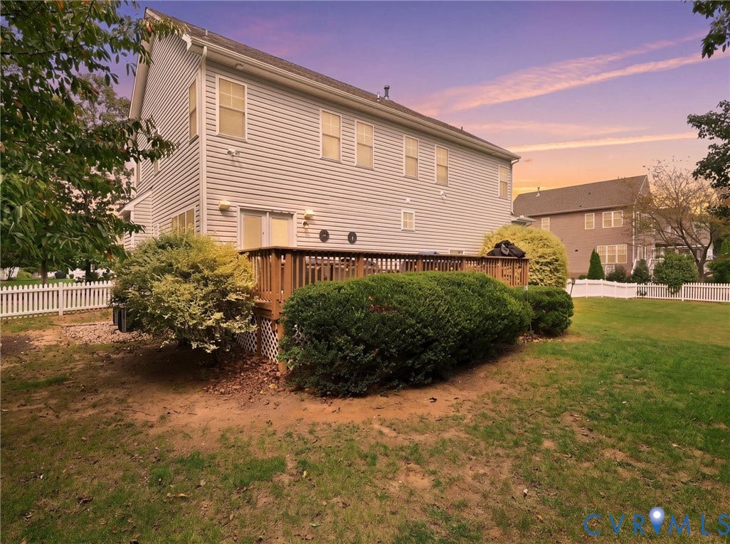 13925 Gorham Lane, Charter Colony, Midlothian, VA 23114 Rear exterior with light gray siding, multi-pane windows, and a wooden deck