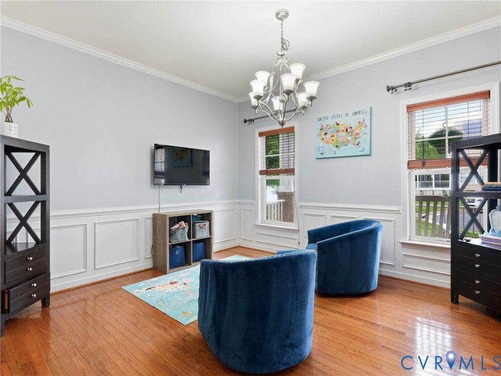 13925 Gorham Lane, Charter Colony, Midlothian, VA 23114 Hardwood flooring, decorative wall paneling, crown molding, and two windows with blinds