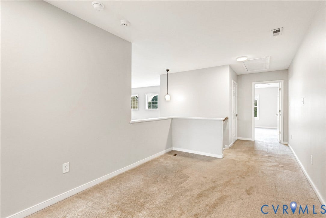 7728 Marshall Arch Drive, Liberty Trace, Mechanicsville, VA 23111 Neutral-toned walls complement plush carpeting