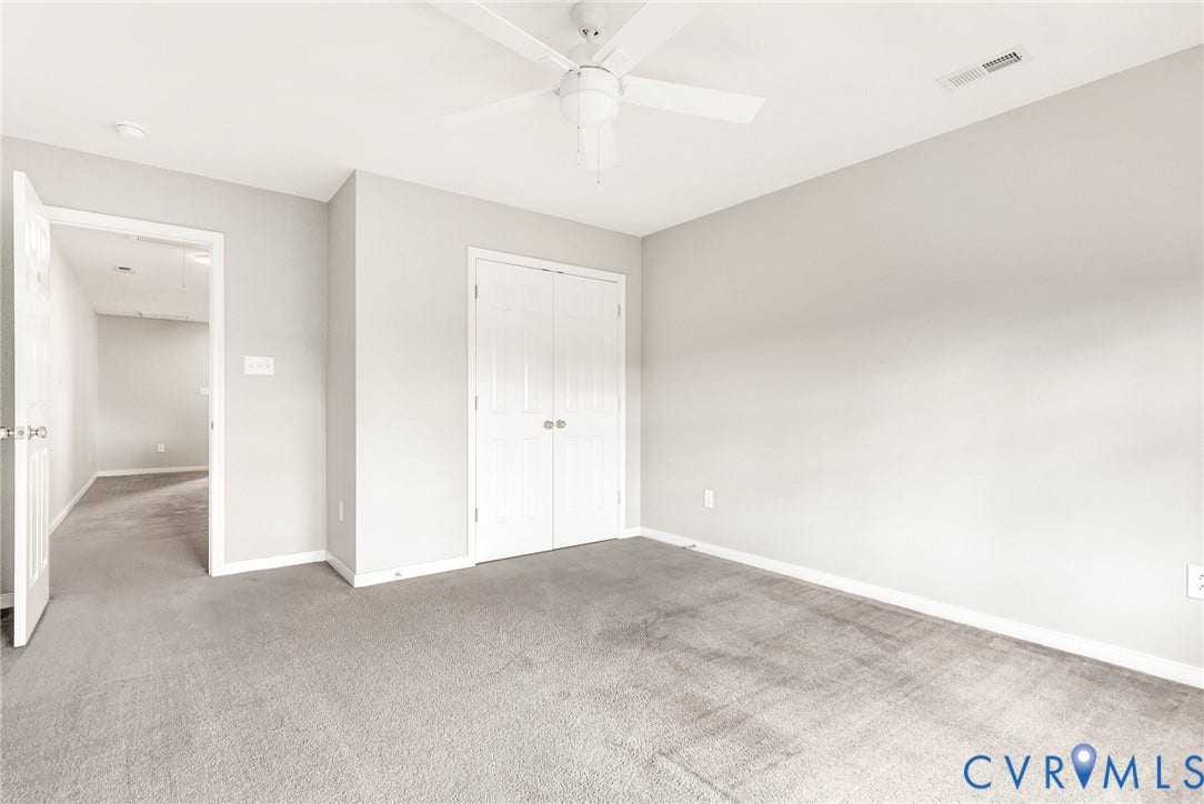 7728 Marshall Arch Drive, Liberty Trace, Mechanicsville, VA 23111 Neutral wall tones, gray carpeting, dual-door closet, ceiling fan, and recessed lighting