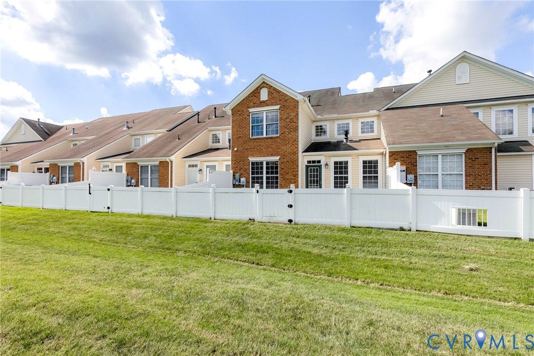 7728 Marshall Arch Drive, Liberty Trace, Mechanicsville, VA 23111 Brick and siding exterior with multiple windows