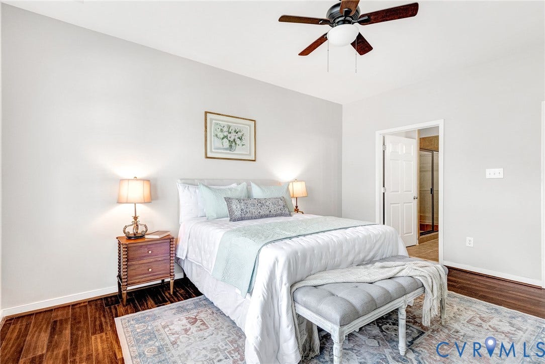 7728 Marshall Arch Drive, Liberty Trace, Mechanicsville, VA 23111 Wood-finish flooring, ceiling fan with integrated lighting, and a white interior door
