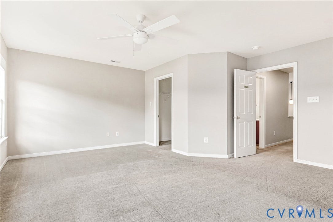 7728 Marshall Arch Drive, Liberty Trace, Mechanicsville, VA 23111 Carpeted room with a ceiling fan, light gray walls, white trim, and white paneled doors
