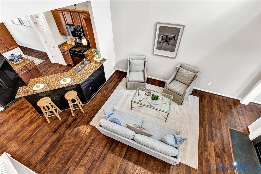 7728 Marshall Arch Drive, Liberty Trace, Mechanicsville, VA 23111 Open-concept layout featuring rich wood-finish flooring