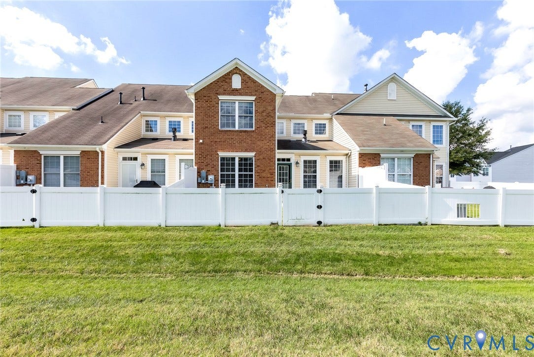 7728 Marshall Arch Drive, Liberty Trace, Mechanicsville, VA 23111 Expansive green space featuring a white privacy fence