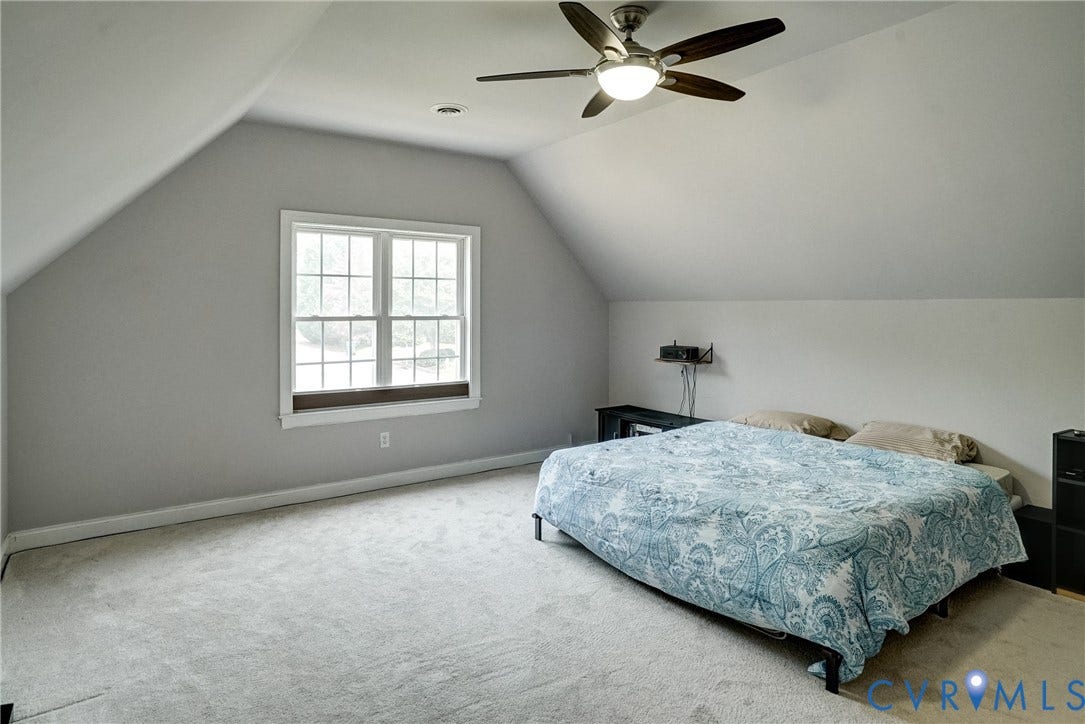 8805 Eli Place, Kings Forest, Glen Allen, VA 23060 Vaulted ceiling with a ceiling fan, recessed lighting, double-hung window, and wall-to-wall carpeting