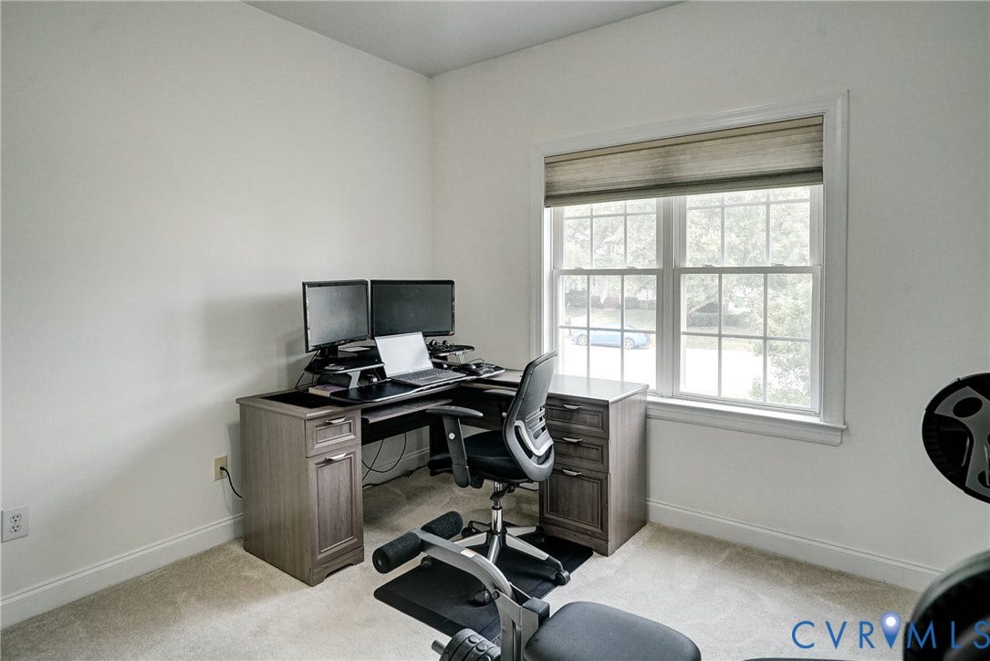 8805 Eli Place, Kings Forest, Glen Allen, VA 23060 Neutral wall paint, carpeted flooring, and a double-hung window with a window treatment