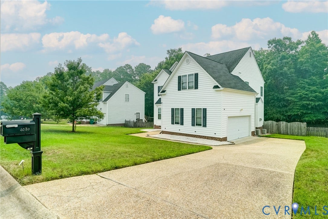 8805 Eli Place, Kings Forest, Glen Allen, VA 23060 Two-story residence with white siding, a dark shingle roof, and a single-car garage