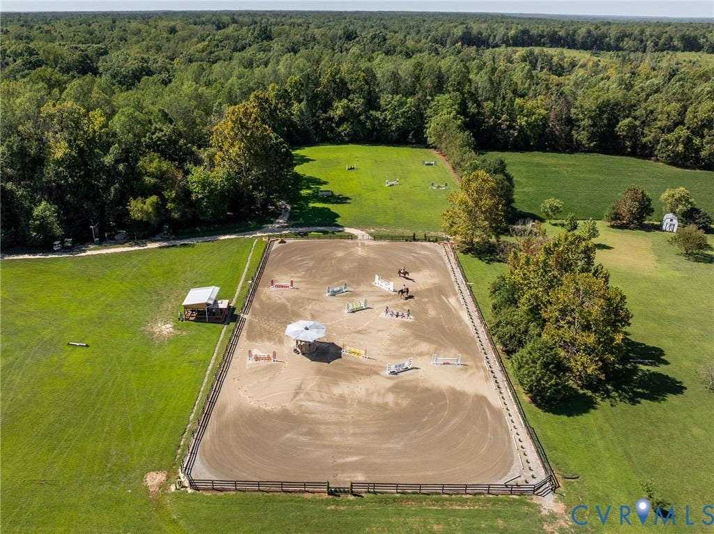 The main ring in use, with excellent footing and generous dimensions for courses and daily training.