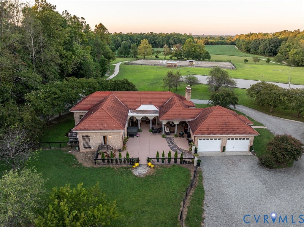 An aerial perspective shows the close relationship between the residence and training facilities.