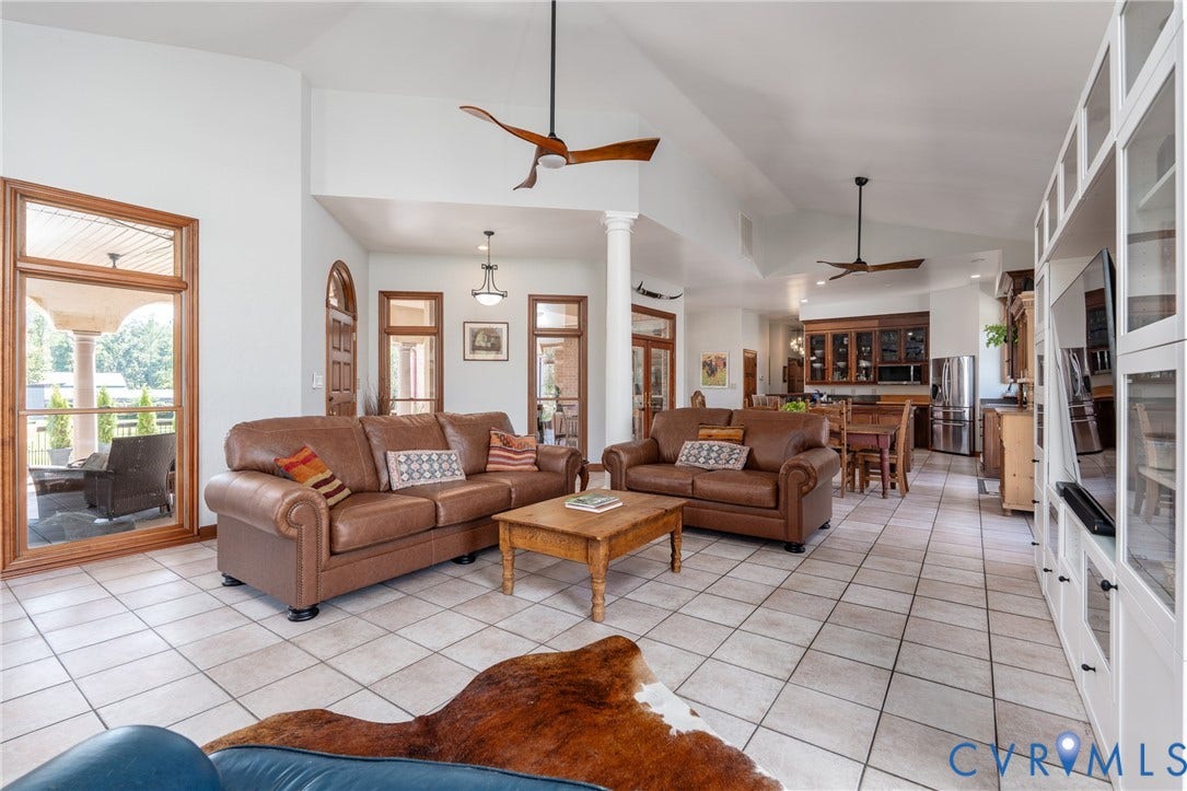 The main living spaces flow together in an open, comfortable floor plan with an open living room, dining room, and kitchen.