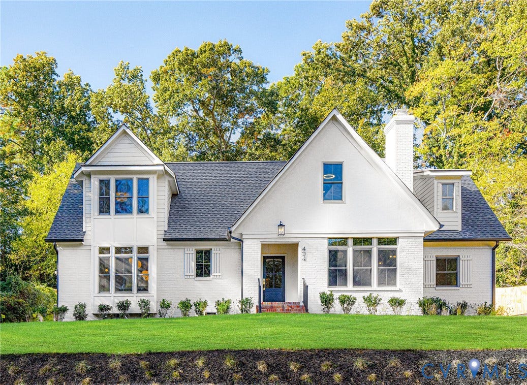404 Waveny Road, Westham, Henrico, VA 23229 Painted brick exterior featuring a steep roofline, gabled dormers, a side-profile chimney, and multi-pane windows