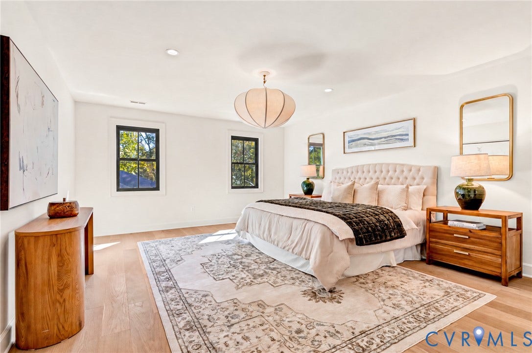 404 Waveny Road, Westham, Henrico, VA 23229 Light-filled room featuring wood-finish flooring, recessed lighting, a modern pendant light fixture, and black-framed windows
