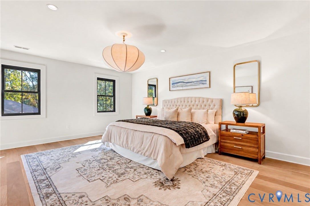 404 Waveny Road, Westham, Henrico, VA 23229 Neutral interior with wood-finish flooring, recessed lighting, architectural pendant fixture, and high-contrast window casing