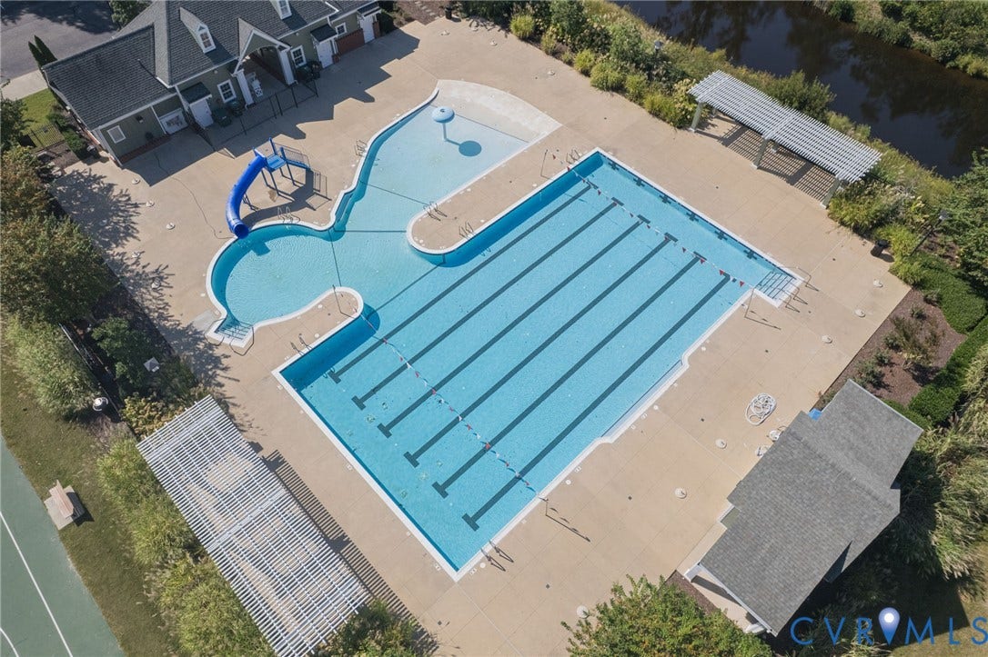7101 Desert Candle Drive, Moseley, VA 23120 Community swimming pool complex featuring a lap pool, recreational pool, and water slide