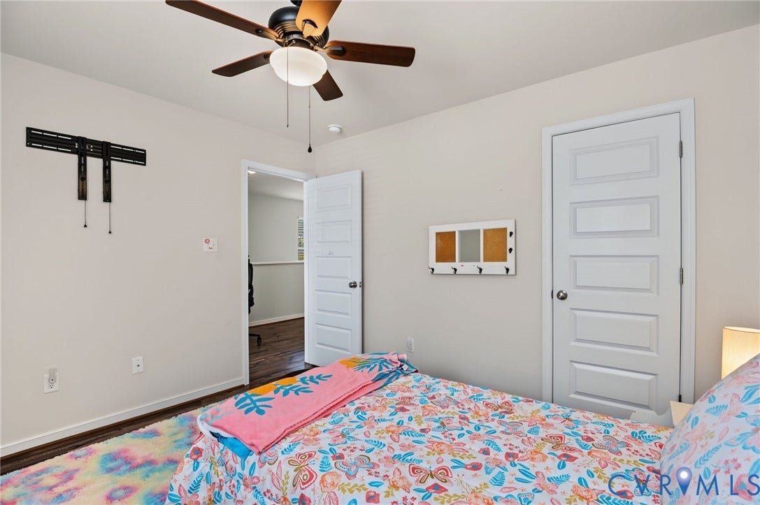7101 Desert Candle Drive, Moseley, VA 23120 Bedroom with ceiling fanand LVP flooring