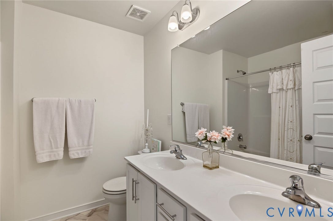 7101 Desert Candle Drive, Moseley, VA 23120 Hall bathroom, tile floooring dual sinks