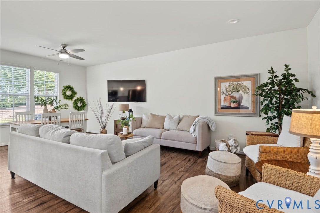 7101 Desert Candle Drive, Moseley, VA 23120 Open-concept living area with LVP flooring and recessed lighting