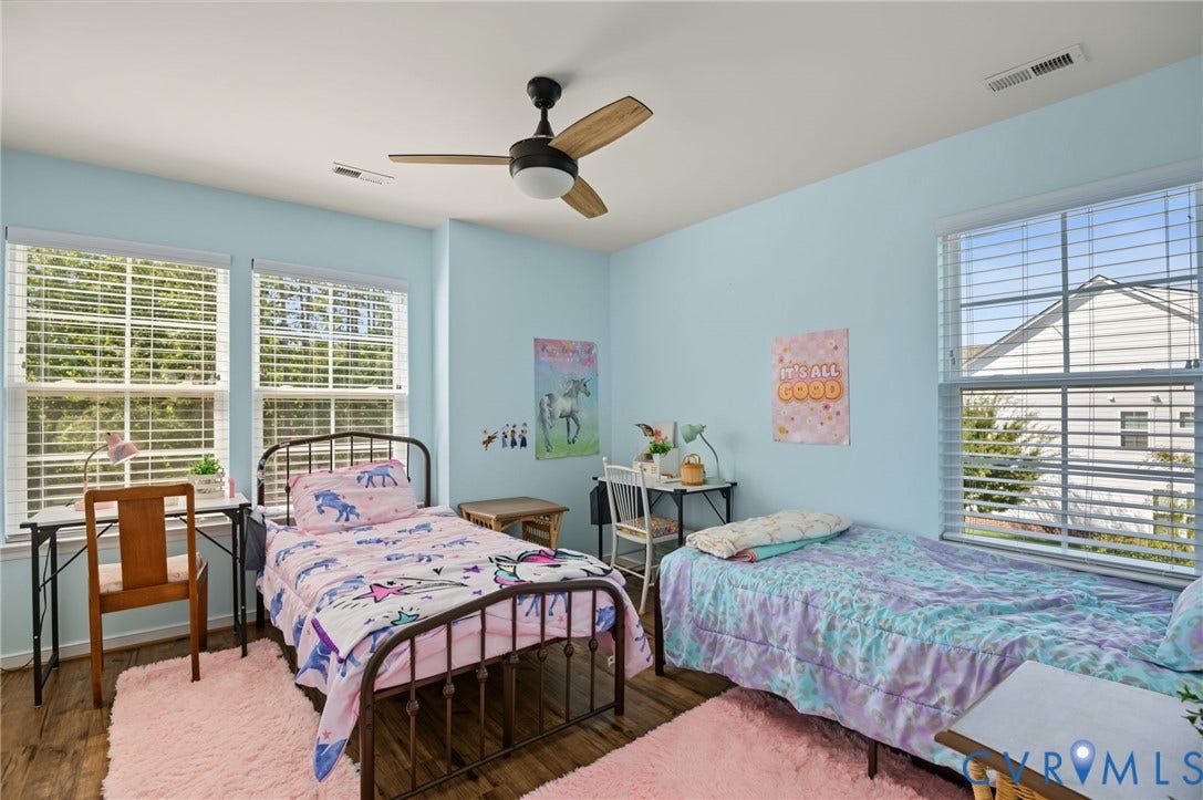7101 Desert Candle Drive, Moseley, VA 23120 Bedroom with ceiling fan and LVP flooring