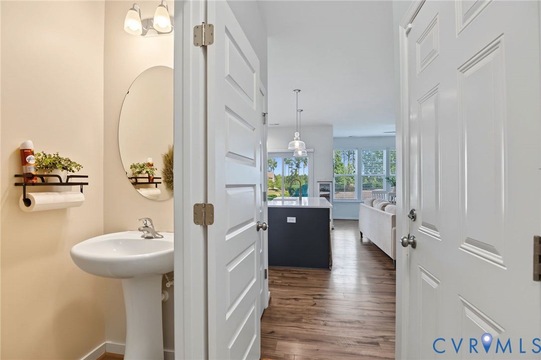 7101 Desert Candle Drive, Moseley, VA 23120 Powder room located near entry area