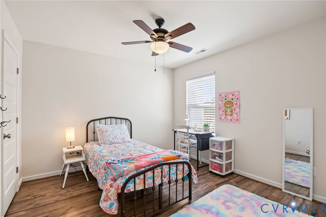 7101 Desert Candle Drive, Moseley, VA 23120 Bright bedroom featuring a ceiling fan