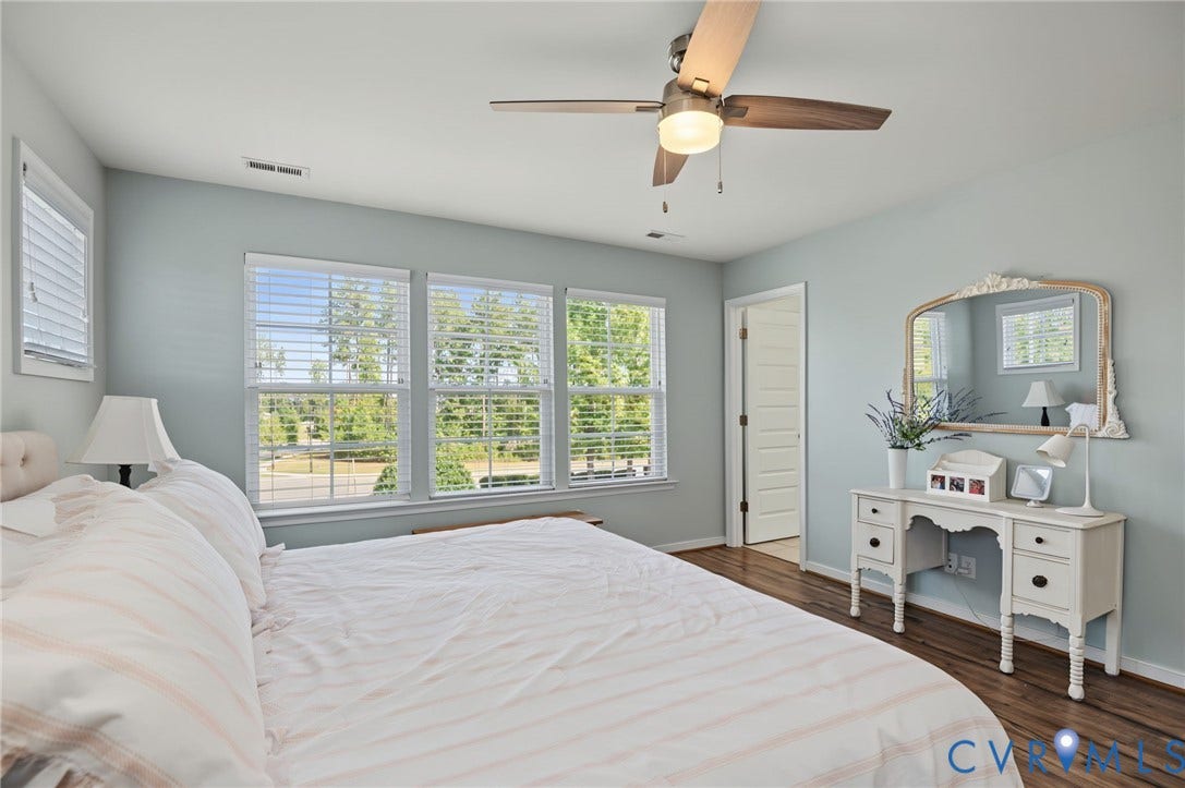 7101 Desert Candle Drive, Moseley, VA 23120 Primary bedroom, ceiling fan, huge walk in closet, LVP flooring