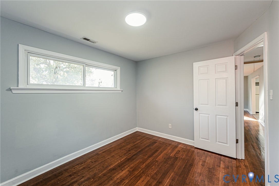Hardwood-style flooring throughout