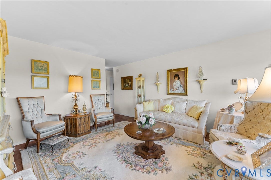 White walls featuring wall sconces and recessed lighting