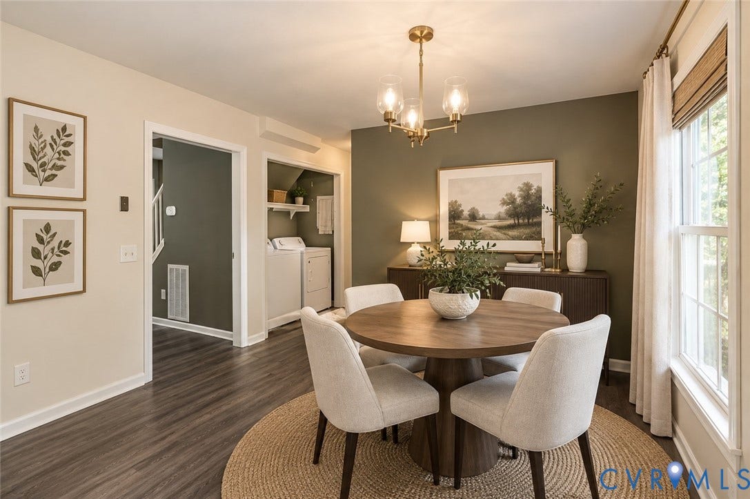 Dining area with wood-finish flooring and a contemporary chandelier