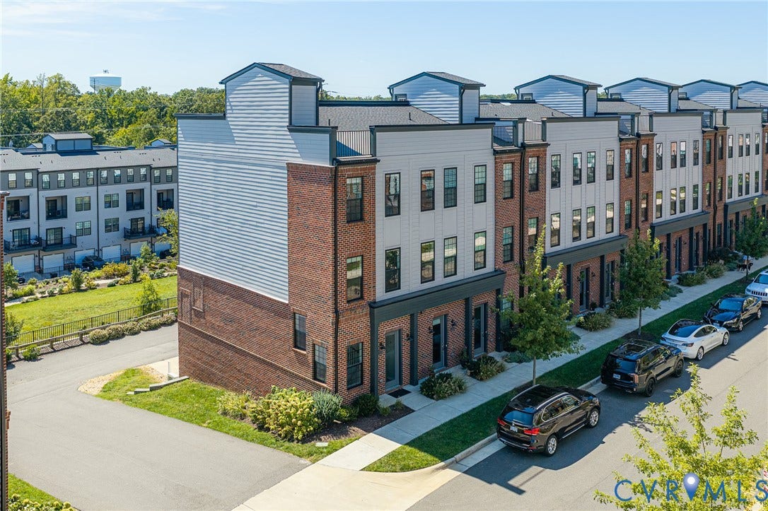 Contemporary townhome design with brick and siding exterior