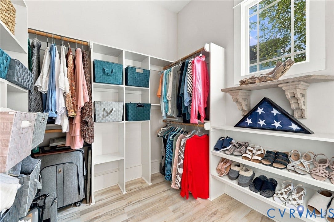 Two spacious primary bedroom closets