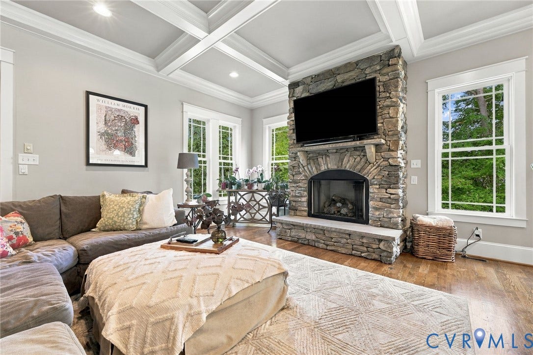 Coffered ceiling and stone fireplace