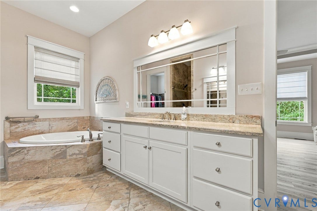Individual vanities, soaker tub and walk-in shower