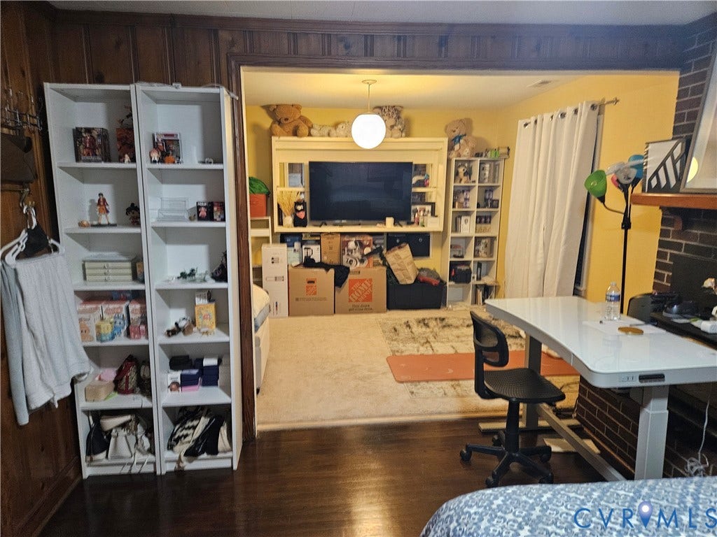 Wood-paneled wall with decorative molding