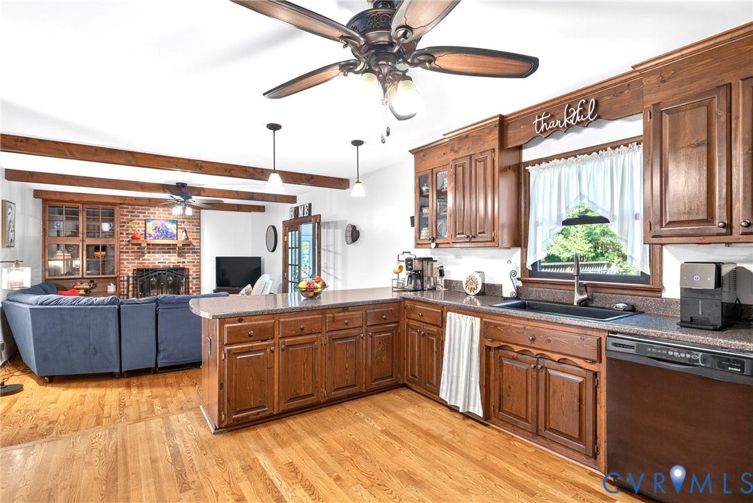 Kitchen showing Sunken Family Room