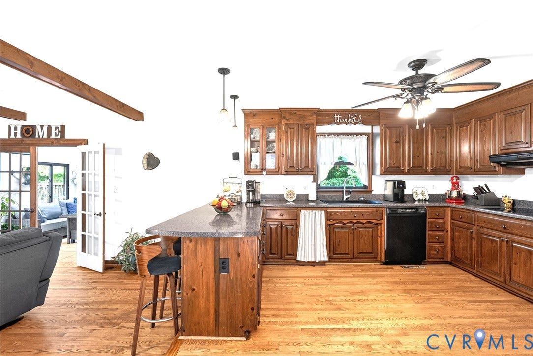 Kitchen with views of Sunroom
