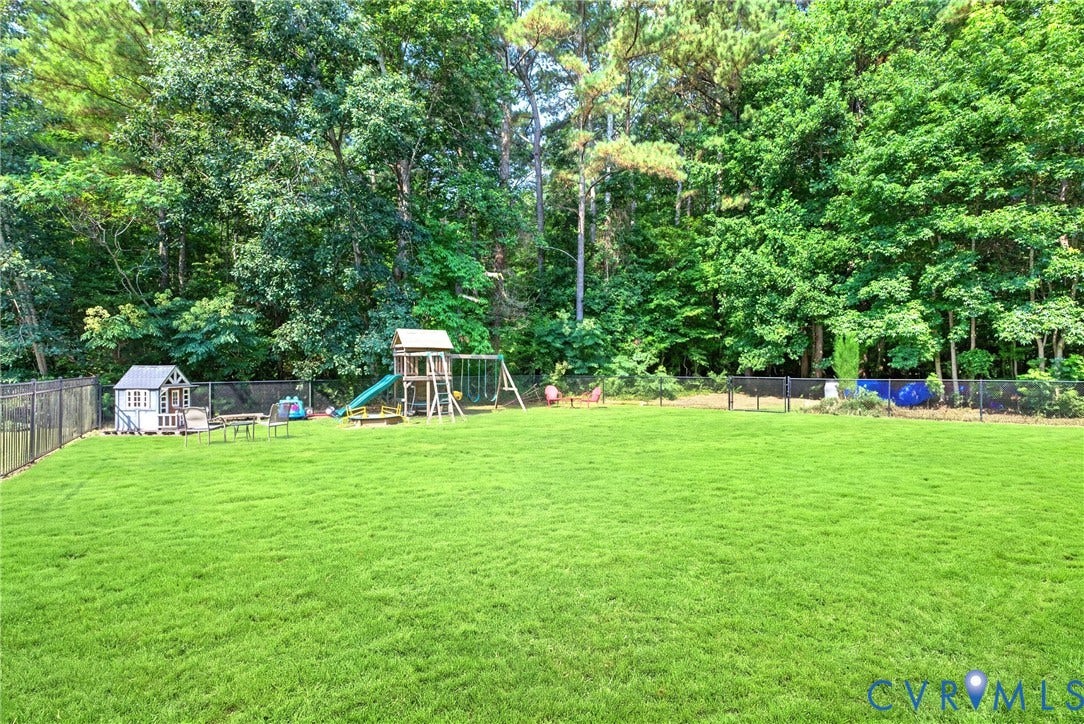 Expansive fenced backyard. Great for Children Playing.