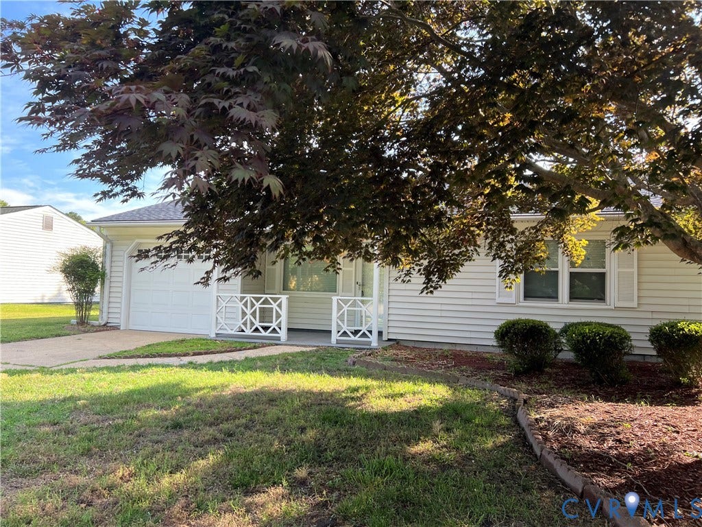 2112 Paramont Avenue, Collegue Park, Chesapeake, VA 23320 Single-story exterior with white siding, an attached garage, and a covered entry featuring white decorative railings