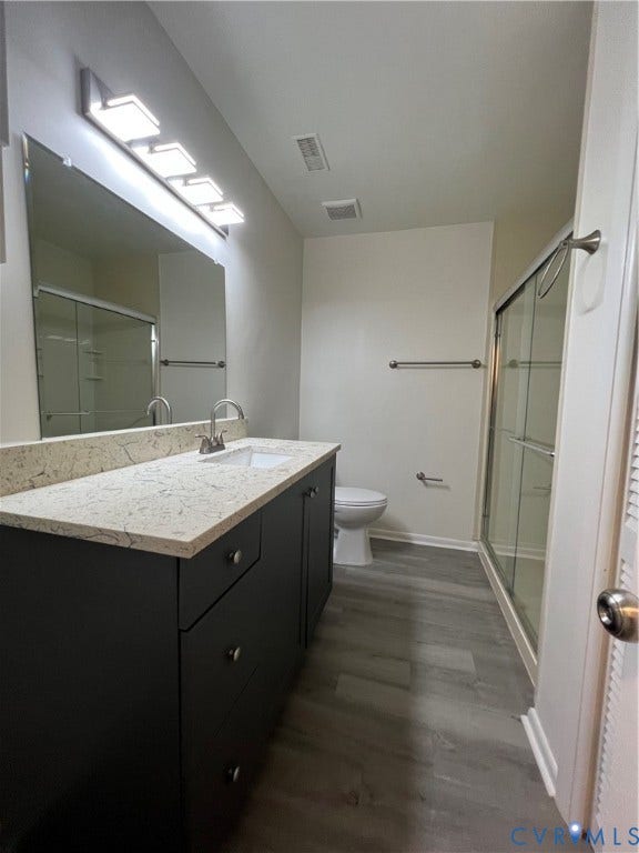 2112 Paramont Avenue, Collegue Park, Chesapeake, VA 23320 Vanity with a light-colored countertop, integrated sink, and dark cabinetry
