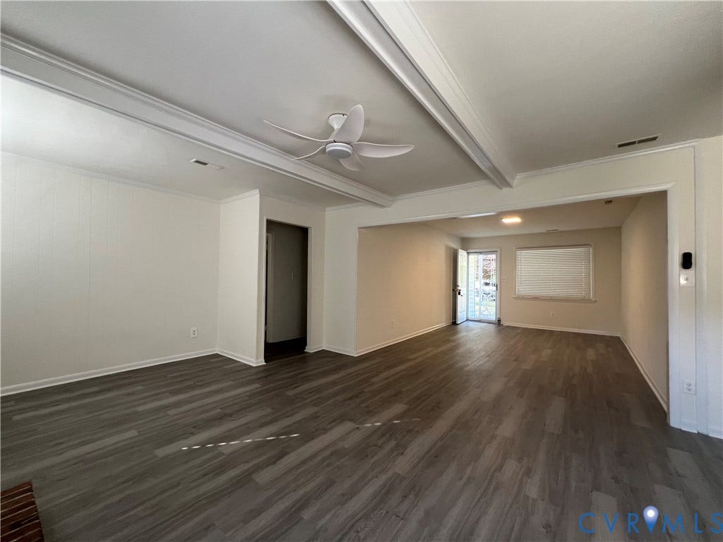 2112 Paramont Avenue, Collegue Park, Chesapeake, VA 23320 Expansive room featuring wood-finish flooring, white paneled walls, and a ceiling fan