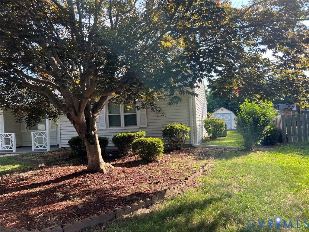 2112 Paramont Avenue, Collegue Park, Chesapeake, VA 23320 Exterior with light-colored siding, white window shutters, and a covered front entry with decorative white railings